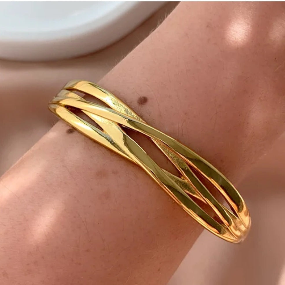 Bracelete entrelaçados Mel em aço inoxidável dourado