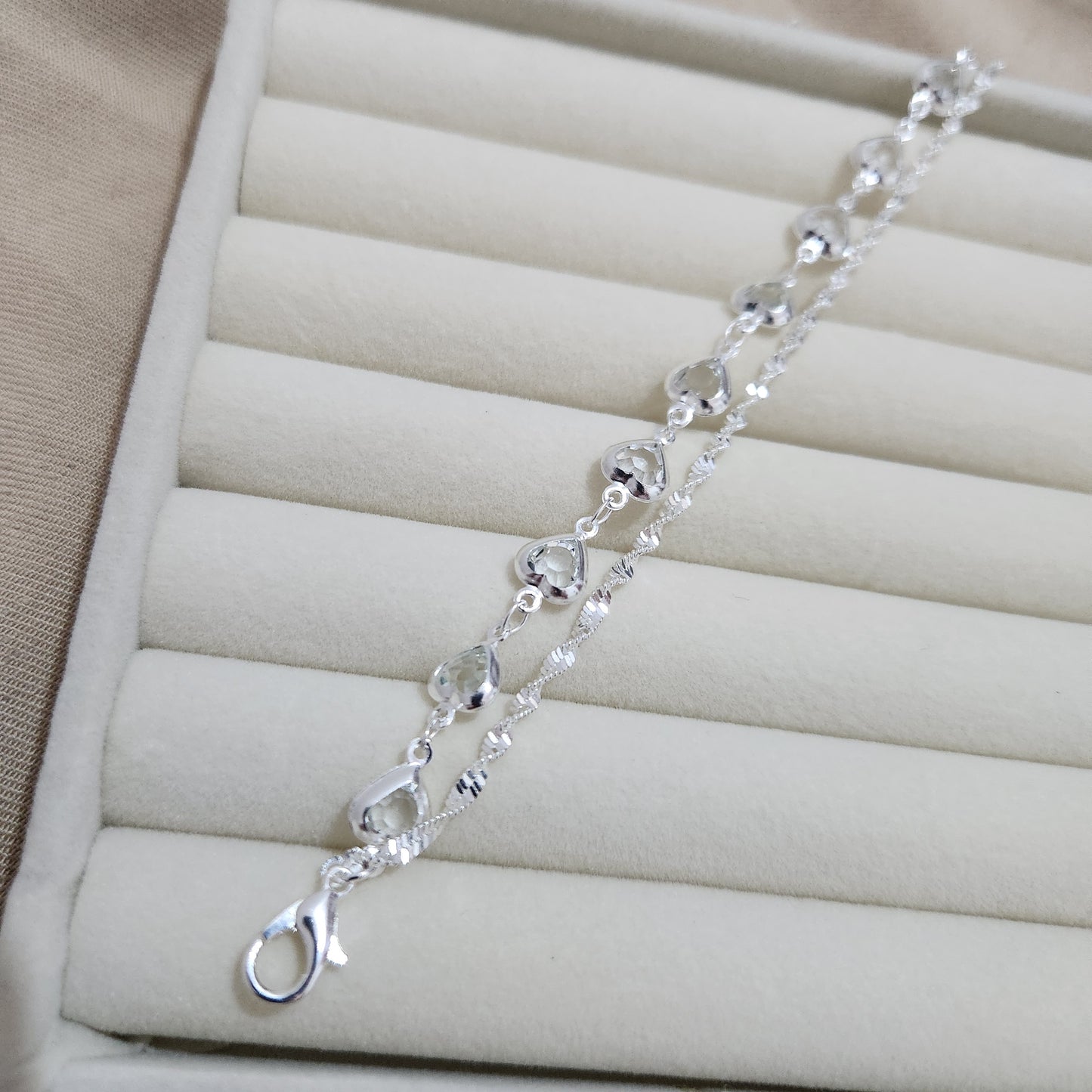 Pulseira dupla folheado a prata com coração transparente Letícia