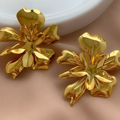 Brinco flor Desirrê aço inoxidável dourado