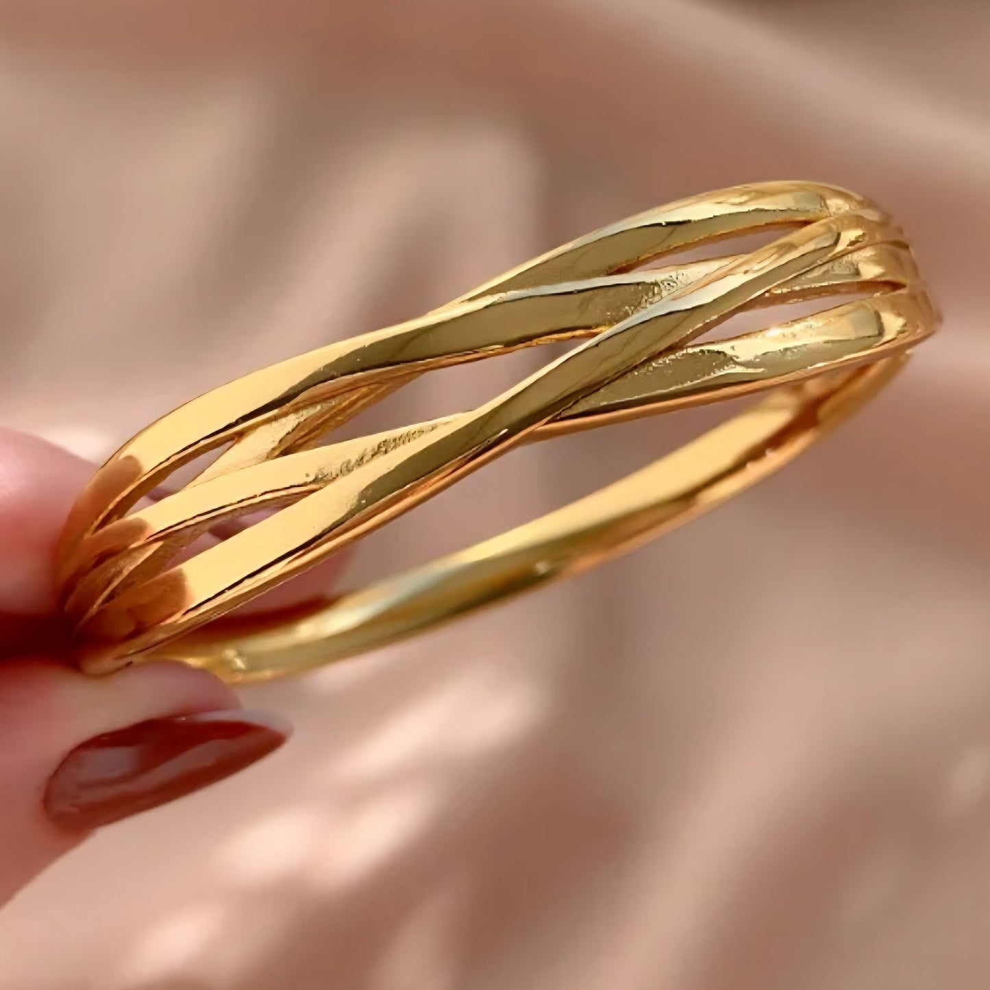 Bracelete entrelaçados Mel em aço inoxidável dourado