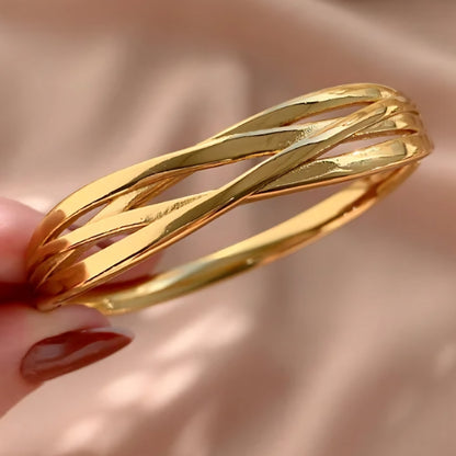Bracelete entrelaçados Mel em aço inoxidável dourado