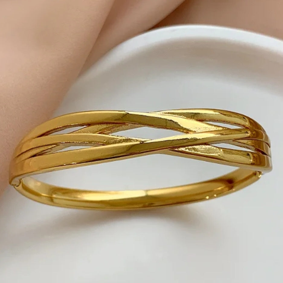 Bracelete entrelaçados Mel em aço inoxidável dourado