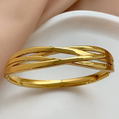 Bracelete entrelaçados Mel em aço inoxidável dourado